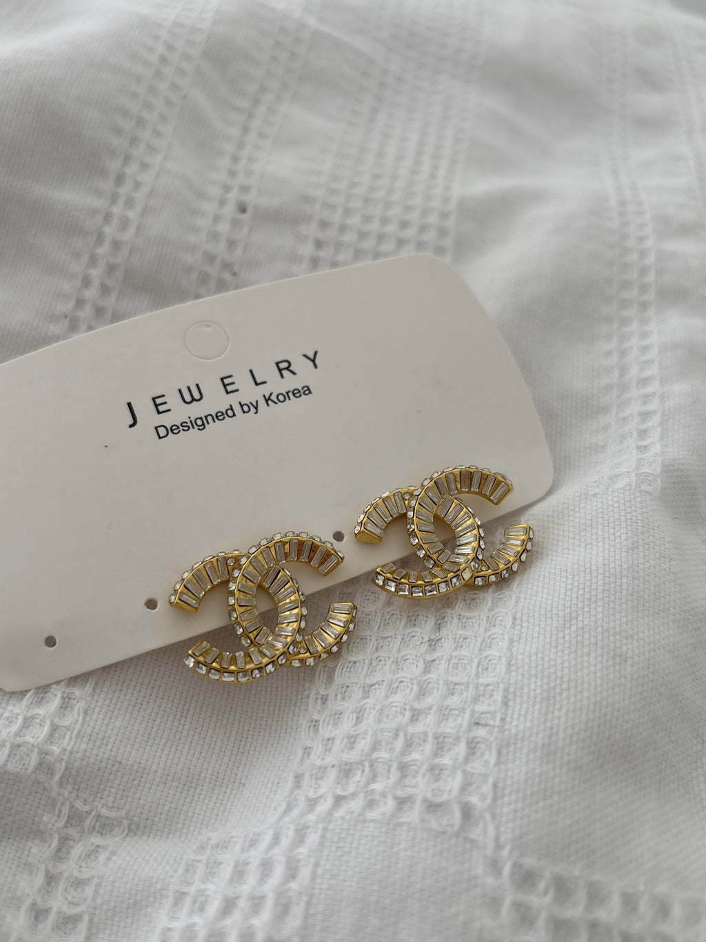 Gold diamond C earrings