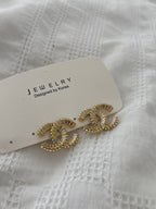 Gold diamond C earrings