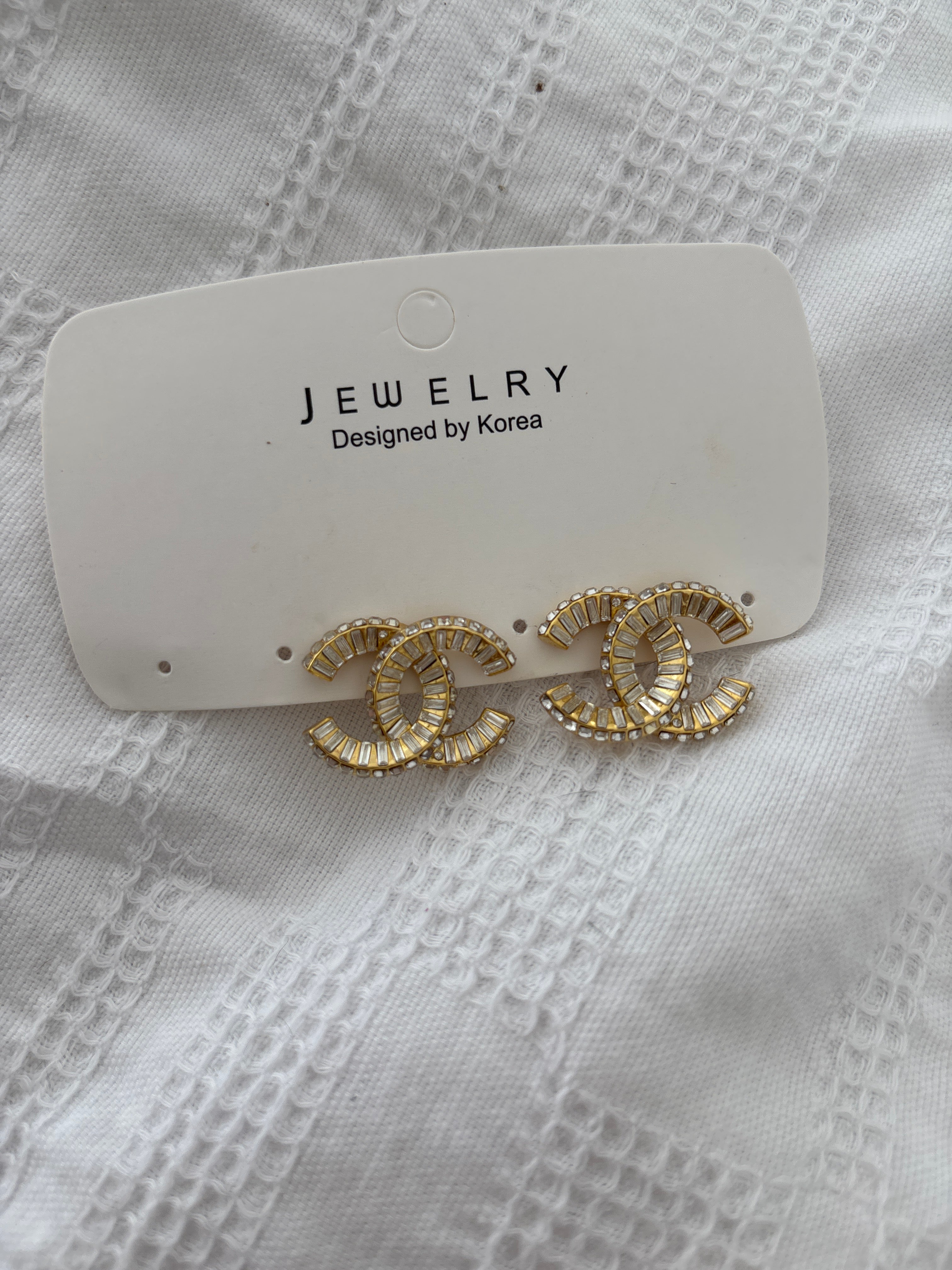 Gold diamond C earrings