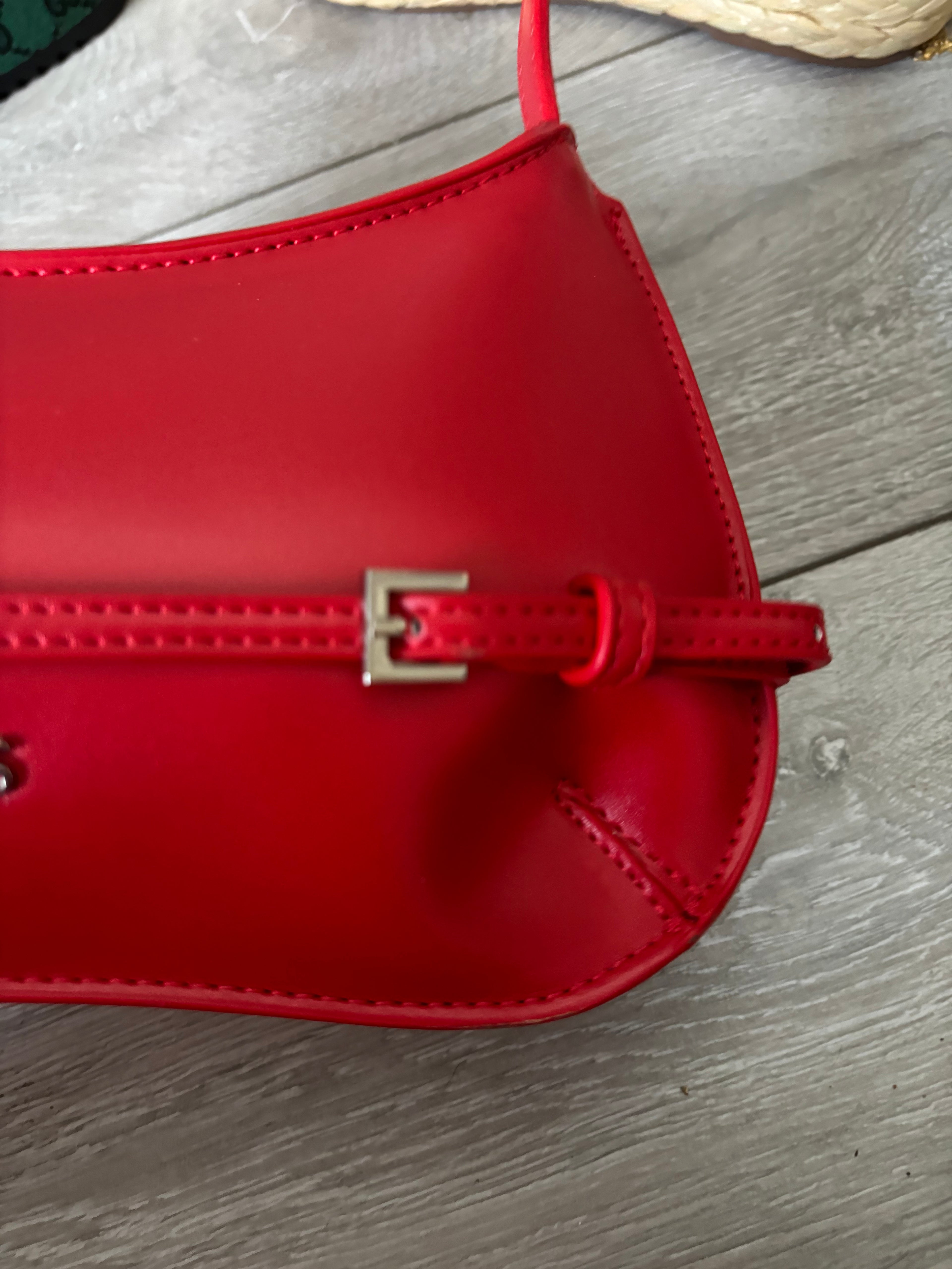 J Red shoulder bag